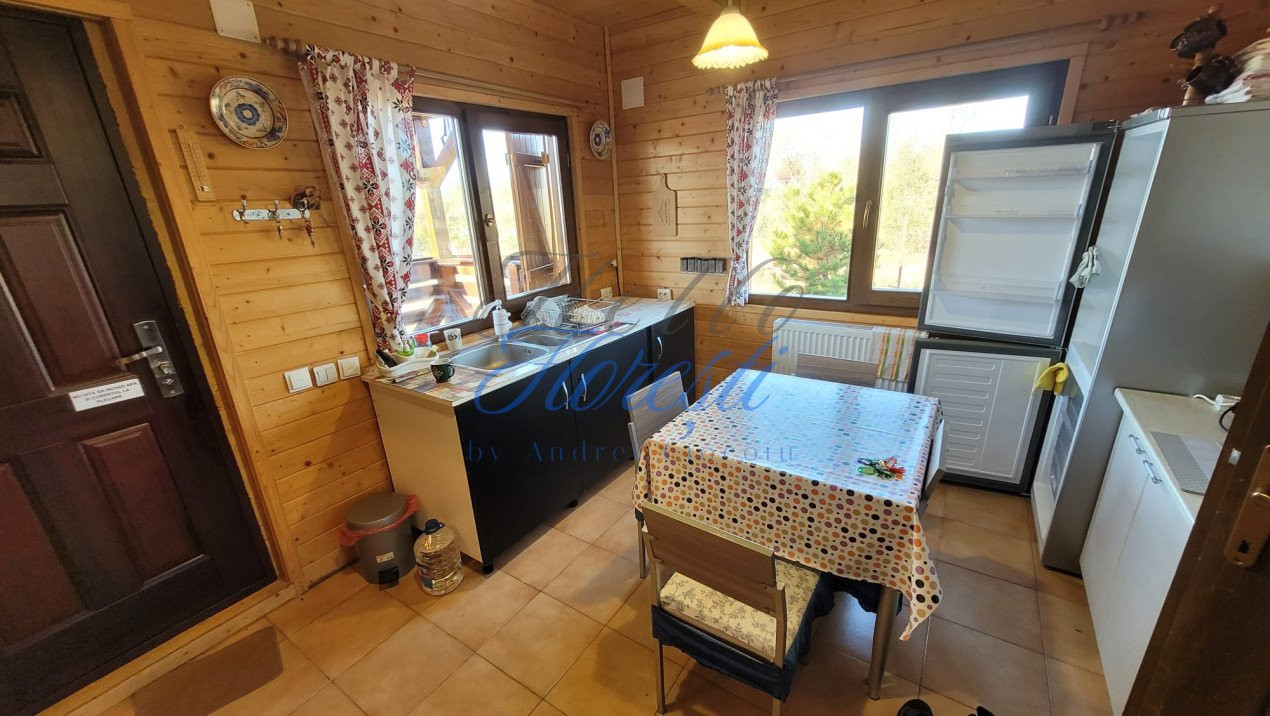 Cabana pe 2 nivele, 1600 mp teren, garaj, zona Rasca