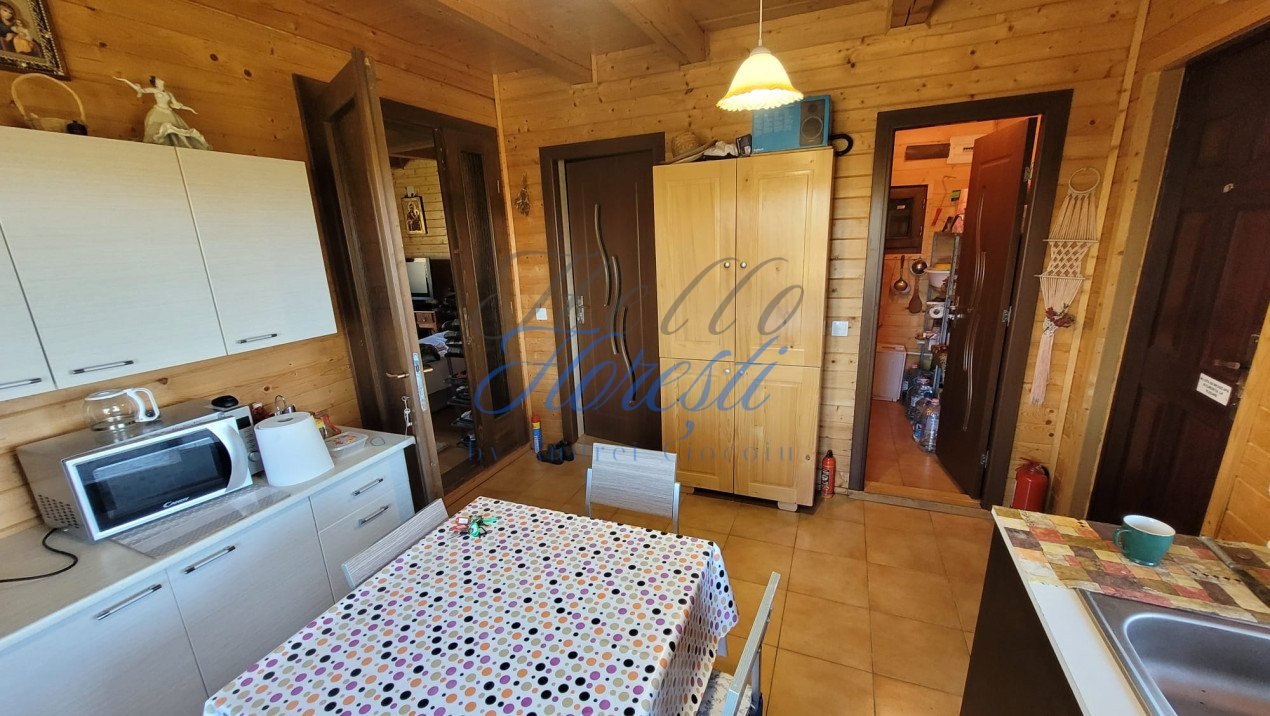 Cabana pe 2 nivele, 1600 mp teren, garaj, zona Rasca