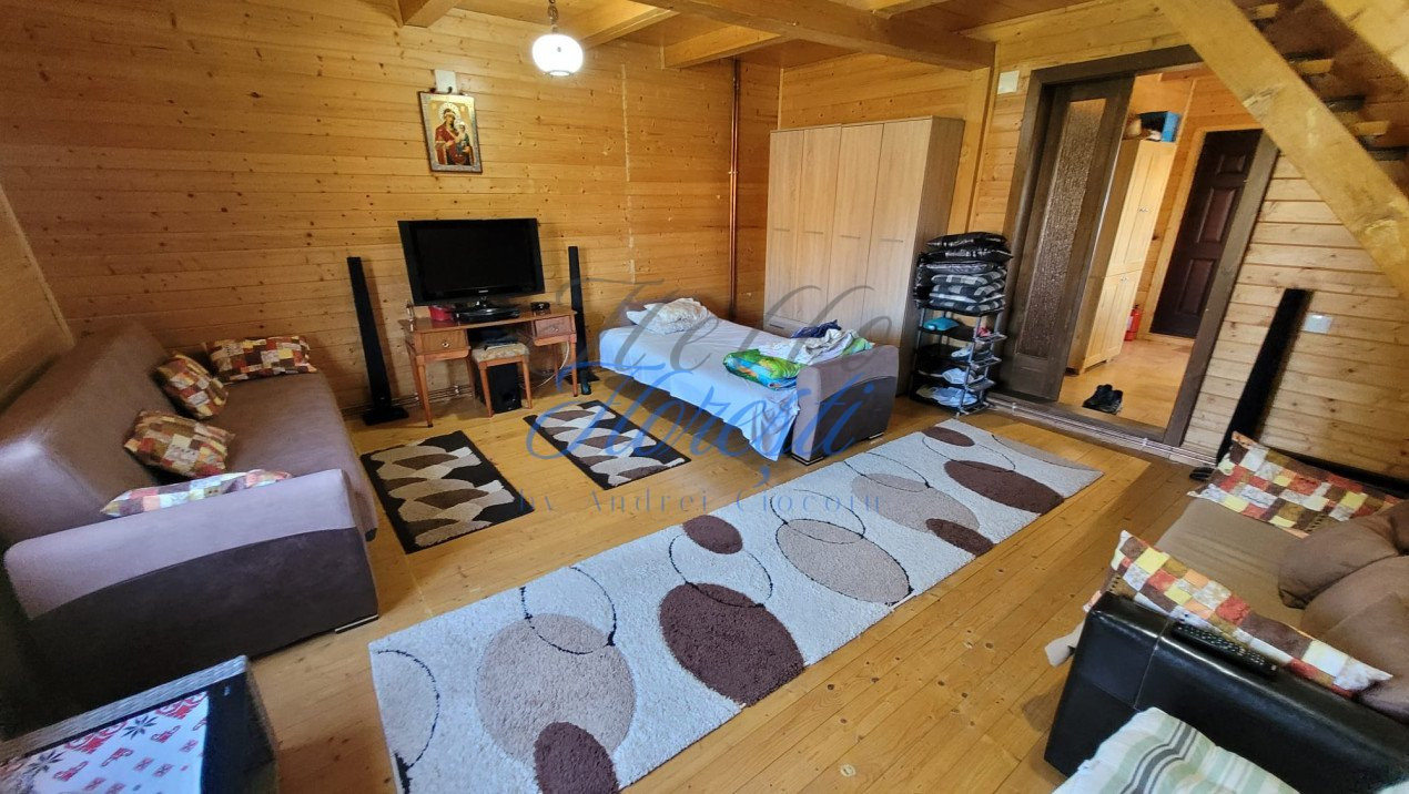 Cabana pe 2 nivele, 1600 mp teren, garaj, zona Rasca