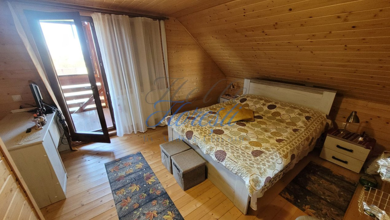 Cabana pe 2 nivele, 1600 mp teren, garaj, zona Rasca