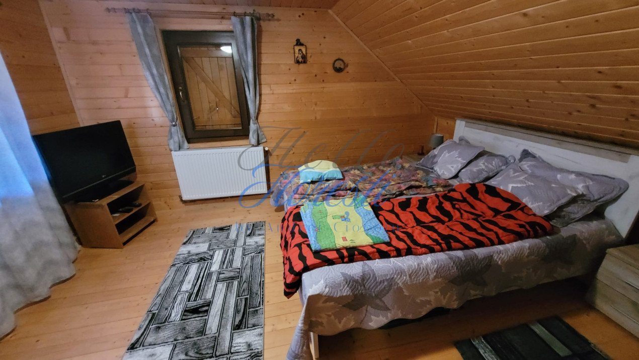 Cabana pe 2 nivele, 1600 mp teren, garaj, zona Rasca