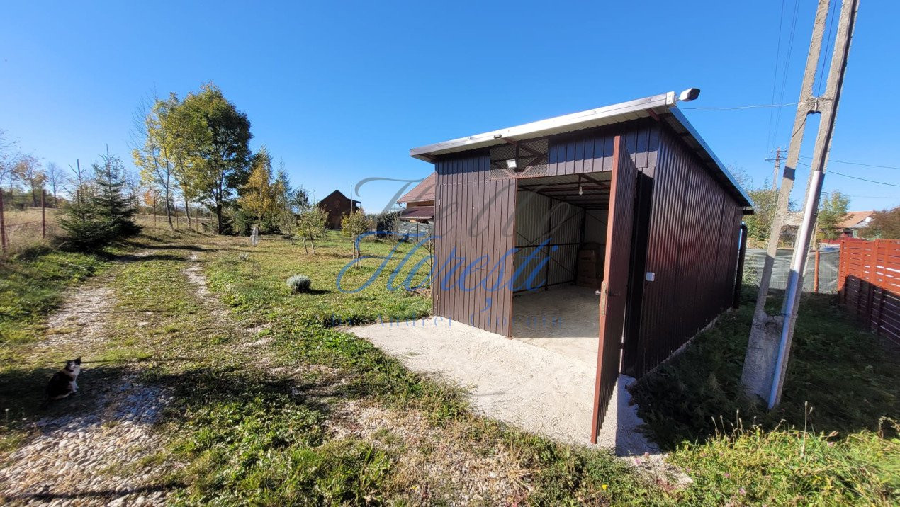 Cabana pe 2 nivele, 1600 mp teren, garaj, zona Rasca