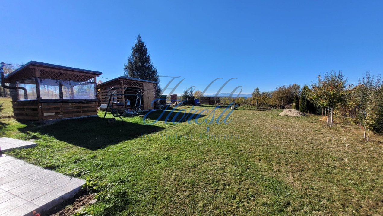 Cabana pe 2 nivele, 1600 mp teren, garaj, zona Rasca