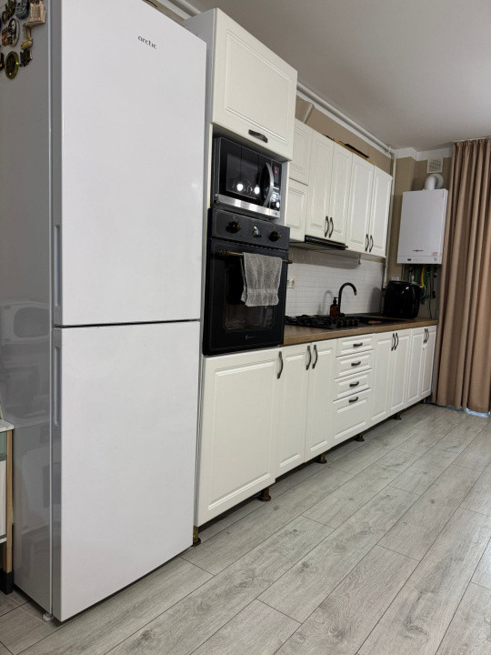 Apartament cu 2 camere + Gradina 50mp + parcare