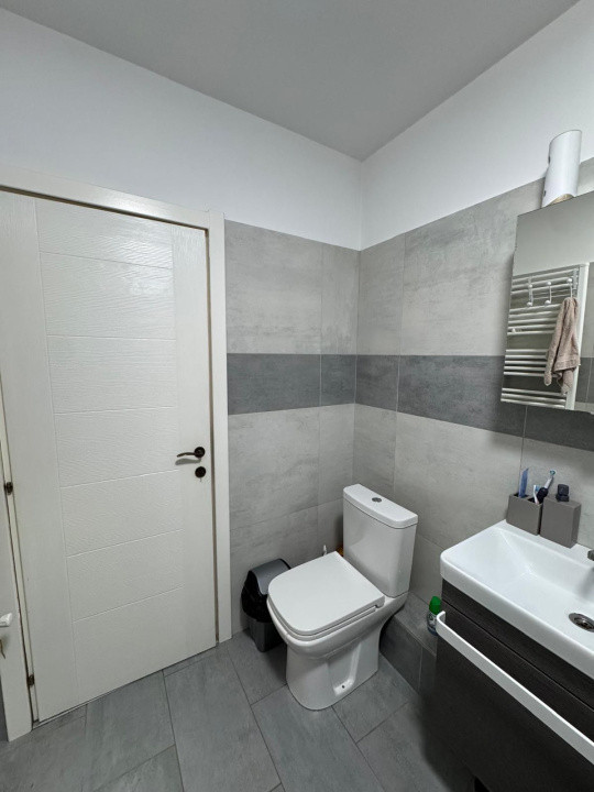 Apartament cu 2 camere + Gradina 50mp + parcare